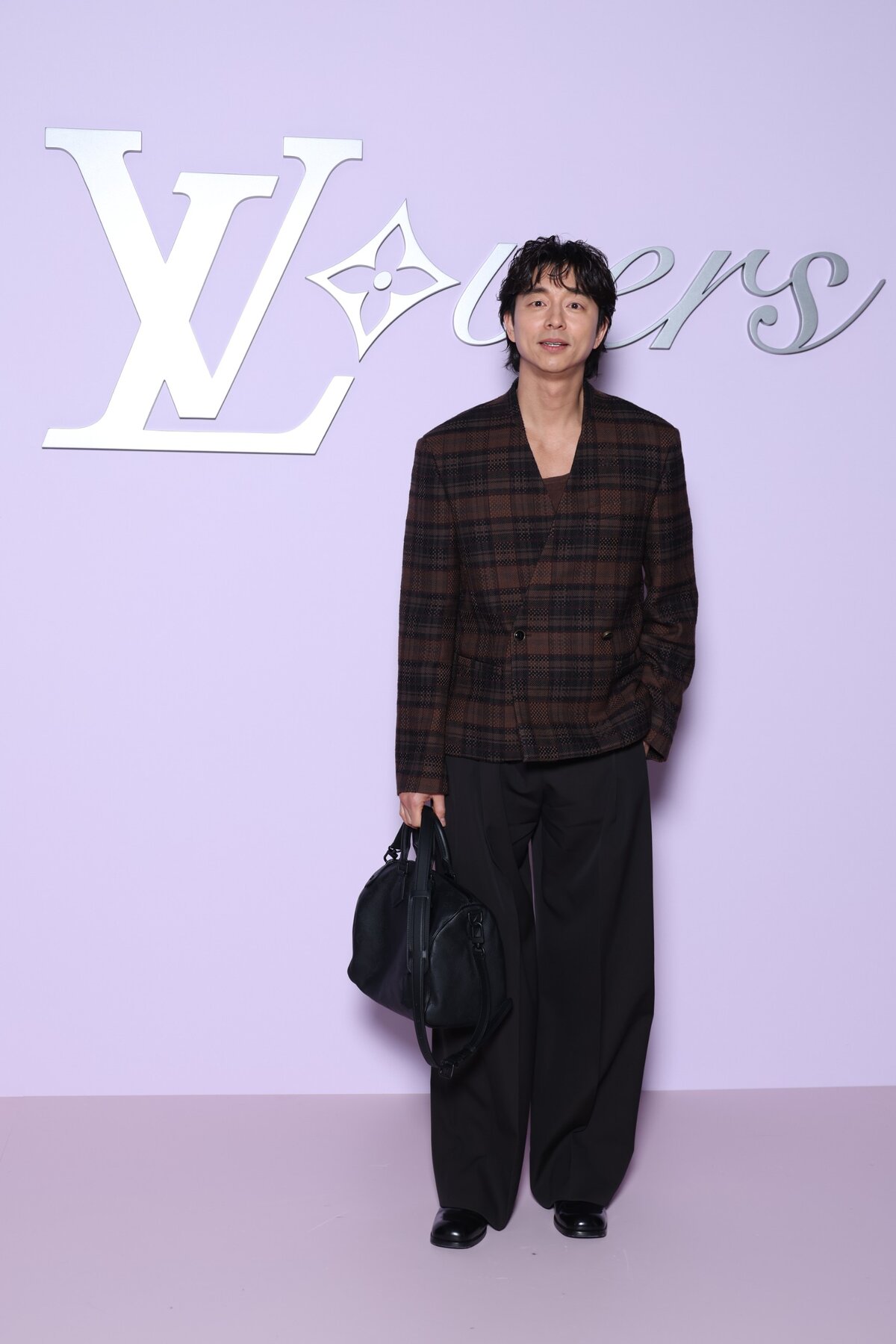 Gong Yoo részt vesz a Louis Vuitton Menswear Fall-Winter 2025/2026 bemutatóján a Párizsi Divathét keretében 2025. január 21-én, Párizsban, Franciaországban. (Fotó: )
